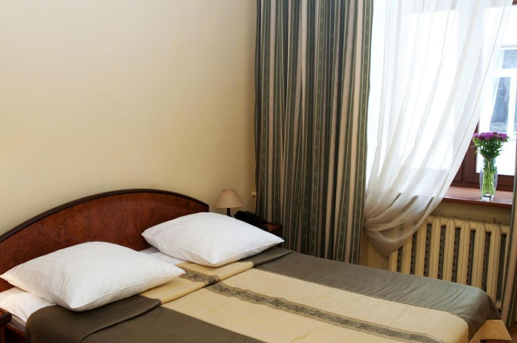 Wien Hotel Lviv Quarto foto