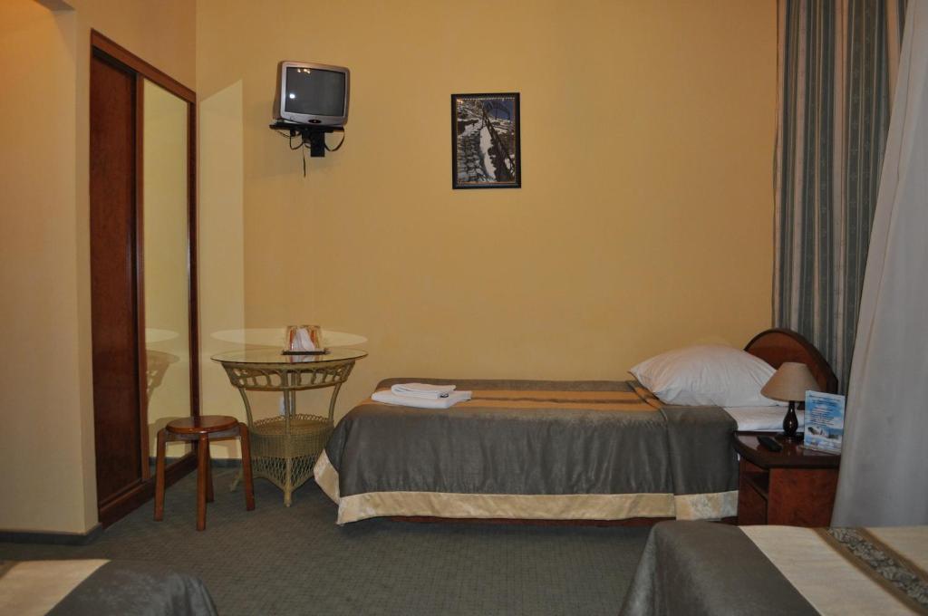 Wien Hotel Lviv Quarto foto