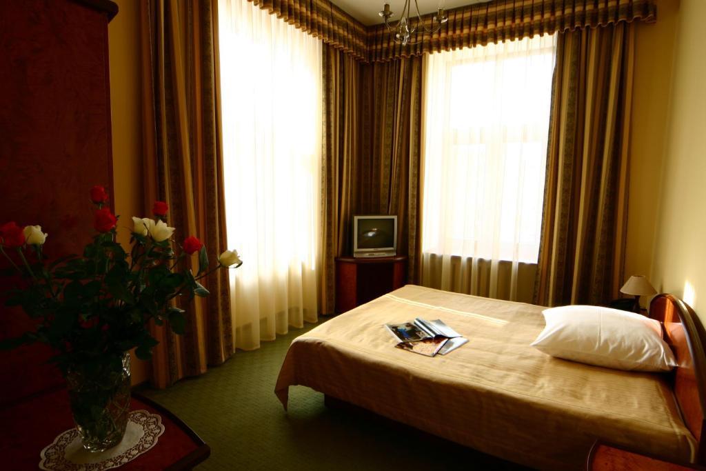 Wien Hotel Lviv Quarto foto