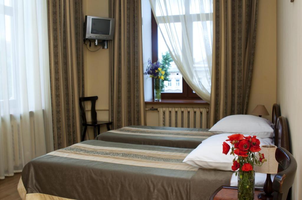 Wien Hotel Lviv Quarto foto