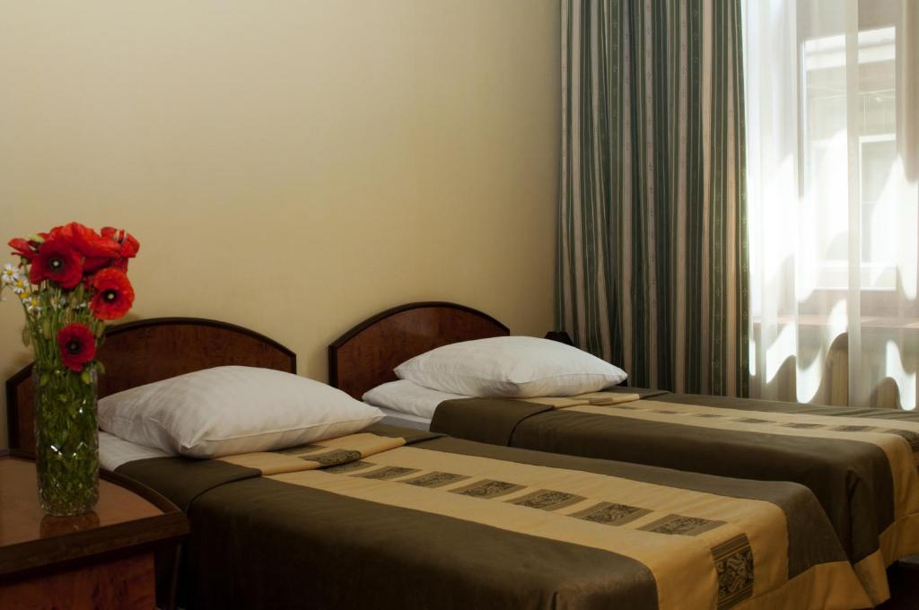 Wien Hotel Lviv Quarto foto