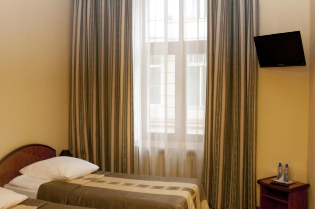 Wien Hotel Lviv Quarto foto