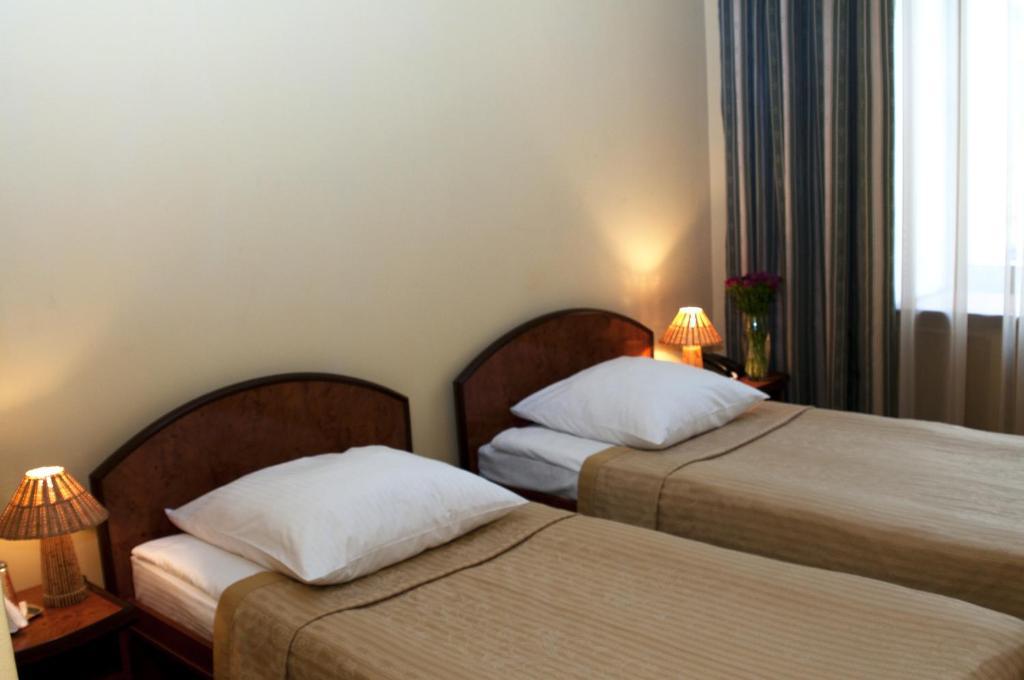Wien Hotel Lviv Quarto foto