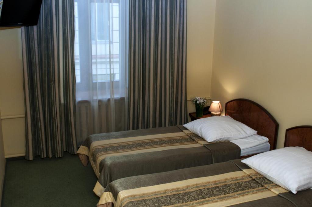 Wien Hotel Lviv Quarto foto