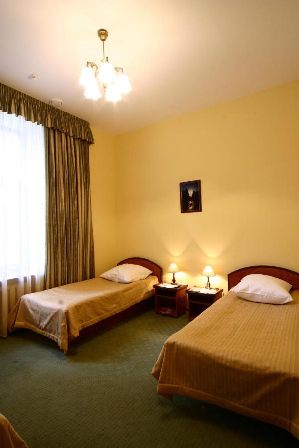 Wien Hotel Lviv Quarto foto